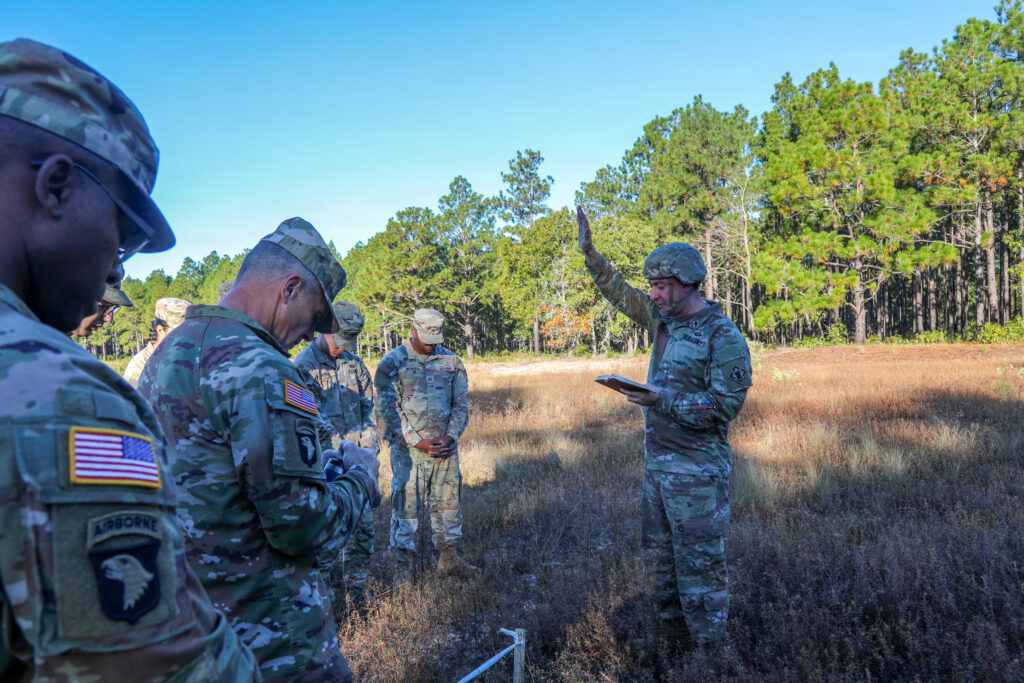 Army practices digging temporary battlefield graves